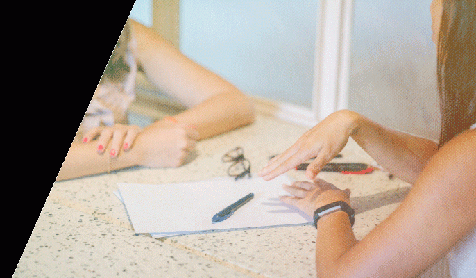 Two women meet as part of the social services coursework