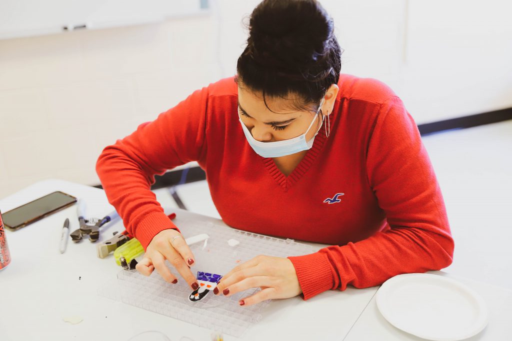 A woman doing a craft