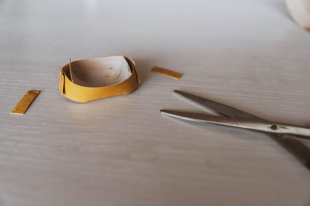 A completed traditional spirit dish with the excess birch bark trimmed away