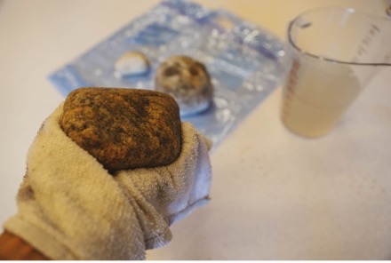 Rock being washed for painting