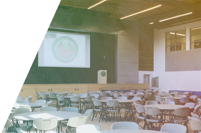 Round tables and chairs set up in SGEI's Kenora event centre