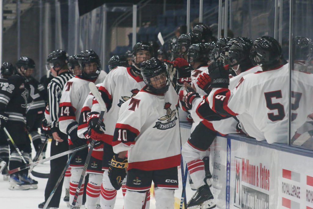Matsun Adams celebrates the Thistles' season-opening goal.