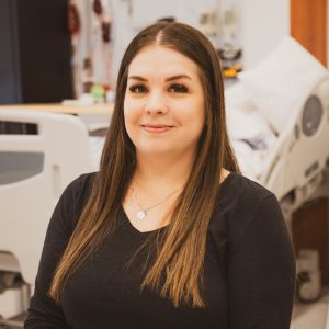 A headshot of Caitlin Scott.